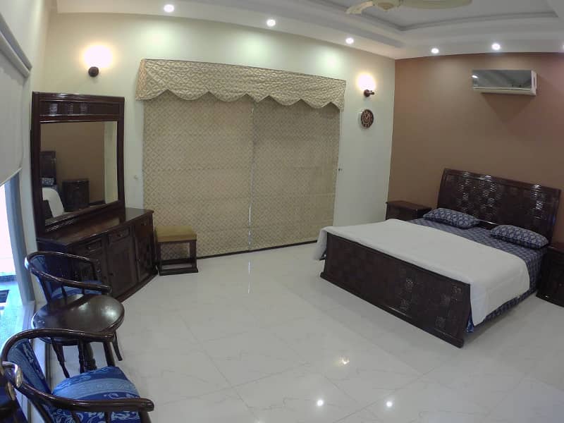 1 Kanal Like brand new Bungalow with 1kanal lush green lawn Available For Rent In DHA Phase 5 With Super Hot Location 11