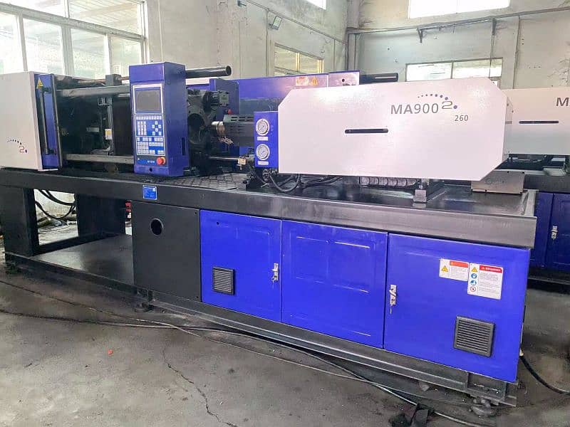 injection moulding machine 14