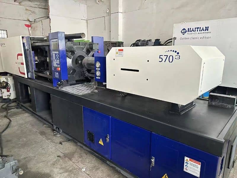 injection moulding machine 19