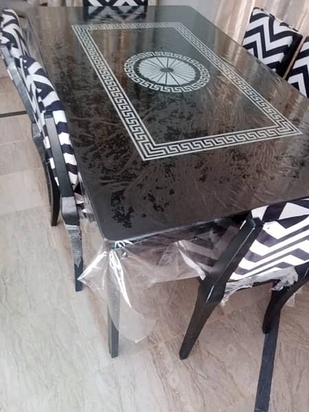 Iron rod and glass top table /chair 6 seater 0