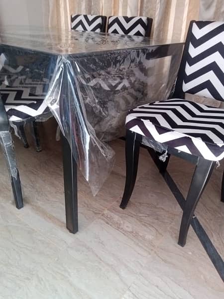 Iron rod and glass top table /chair 6 seater 2