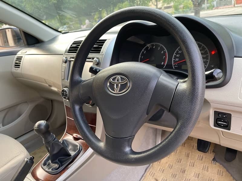 TOYOTA COROLLA 2014 GLi LAHORE REGISTERED 14