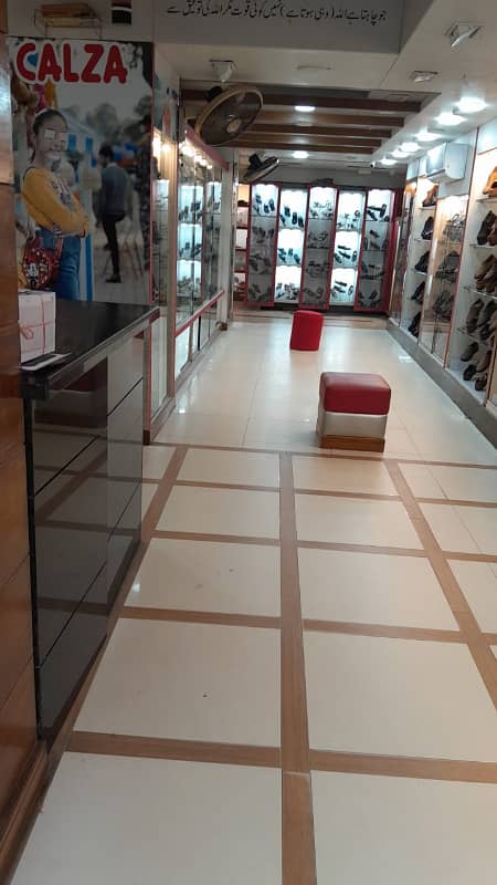 shop available in best location best shop for investment & handsome earning beautiful commercial location very wide 2