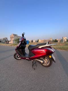 united scooty 100cc