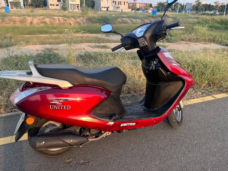 united scooty 100cc 5