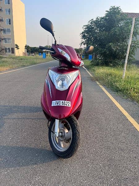 united scooty 100cc 7