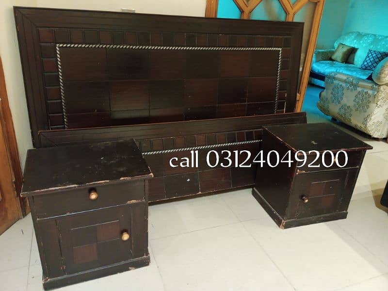 slightly used wooden bed with side tables 1