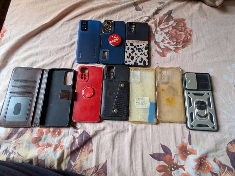 Redmi note 11 6 128 gb with 8 covers and genuine box 0