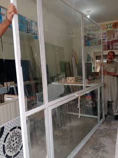 Shop front door frame with glass