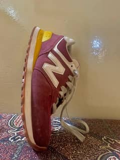 Newbalance shoes maroon colour