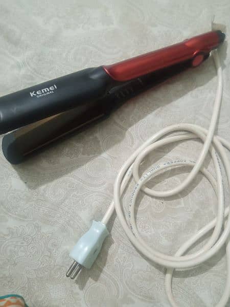 hair straightener kemei 1