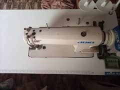 A sewing machine with surbo motor in new condition