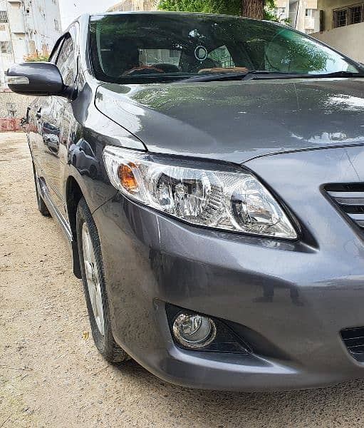 Toyota Corolla Altis 2010 Full Original Paint Brand New Condition. 4