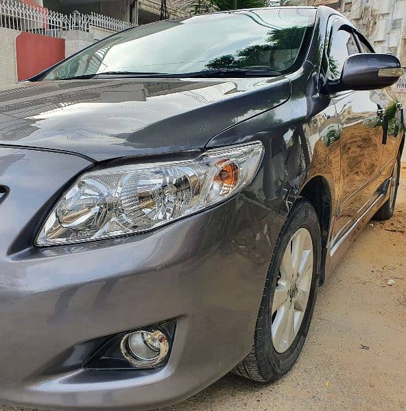 Toyota Corolla Altis 2010 Full Original Paint Brand New Condition. 5