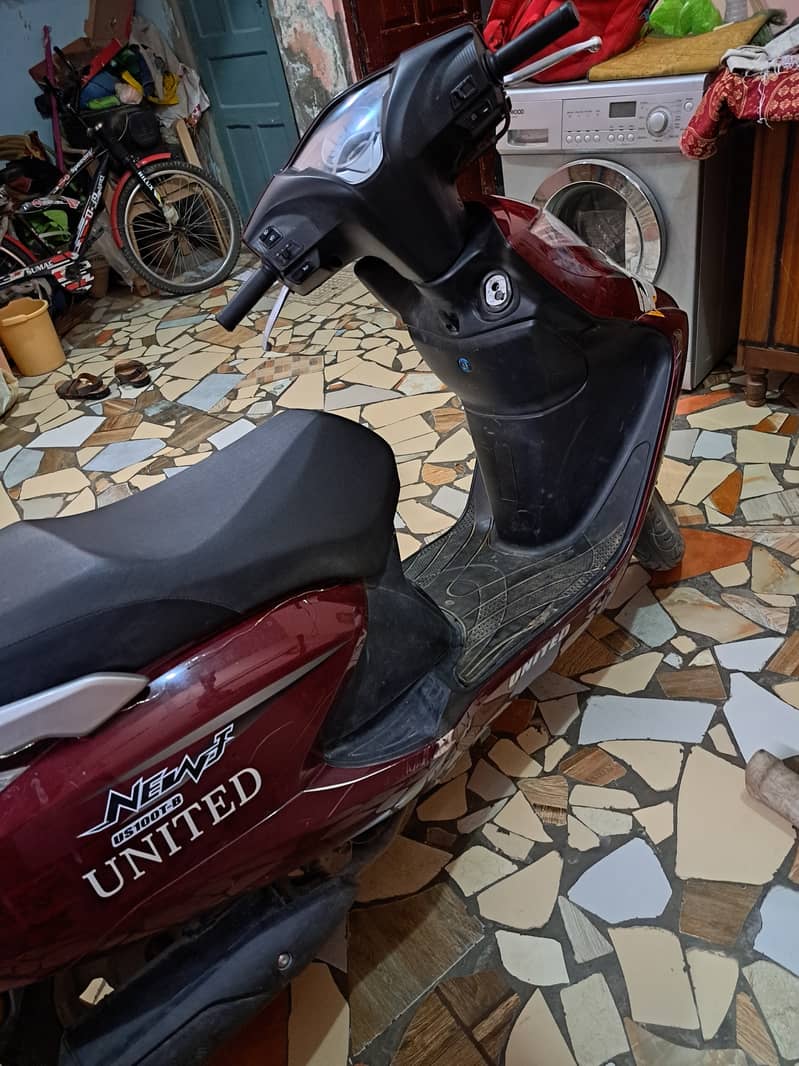 United scooty 100 cc 4