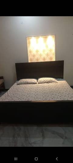 kind size wooden Bed for sale 0