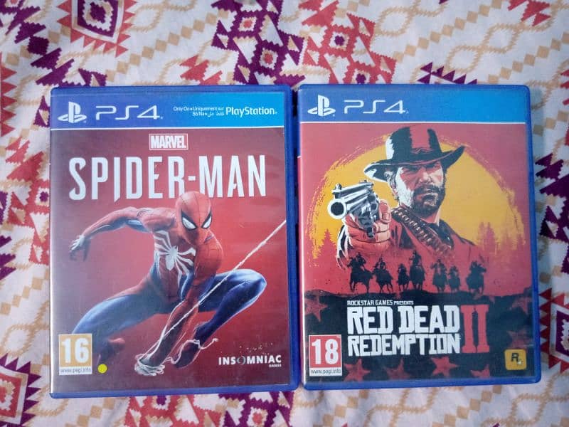 RDR 2 & Marvels Spiderman Ps4 Dvds available for sell 3