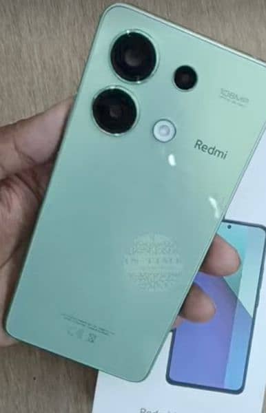 Redmi note 13. sirf daba open kiya ha 10