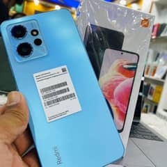 redmi note 12 owsam blue colour good condition and all each them