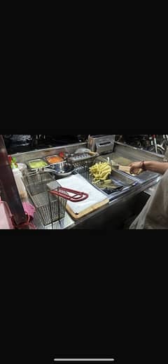 fast food ka pura setup available ha counter or saman