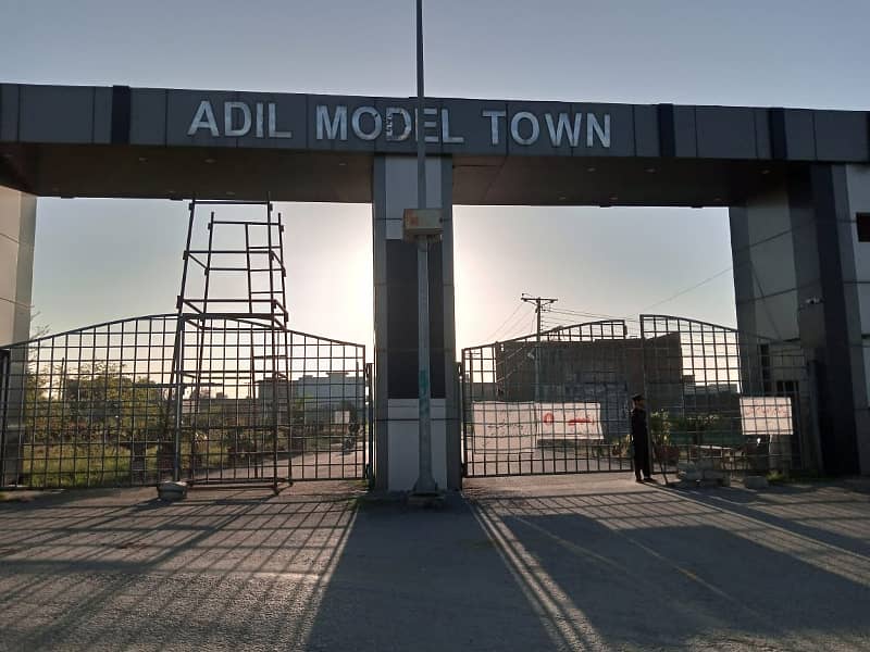 Adil Model Town Block E 10 Marla Plot Available for Sale 1