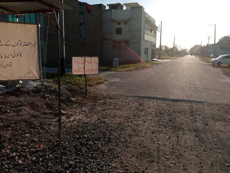 Adil Model Town Block E 10 Marla Plot Available for Sale 3