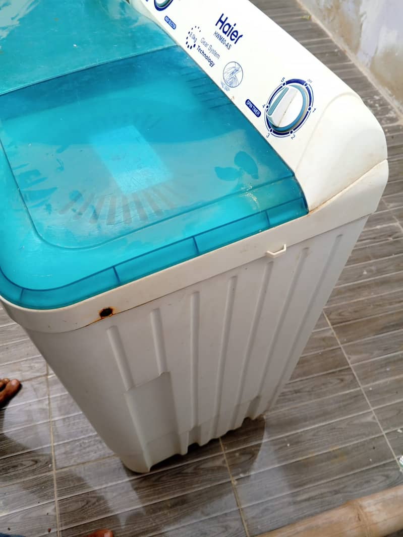 Haier washing machine with dryer  and crony outdoor speaker 1