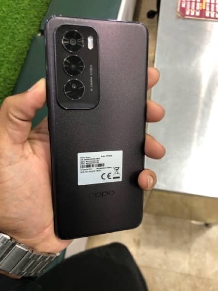 oppo Reno 12 512gb BAs Ak bar khali charge Kiya ha mobile 2 days use h 4