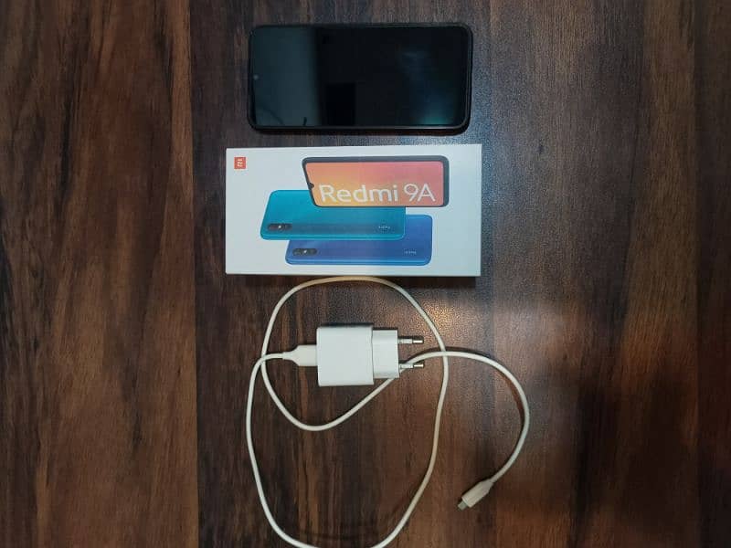 Xiaomi redmi 9a, 2gb ram & 32gb rom with box and charger. 0