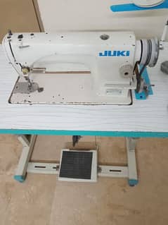 Juki machine with servo motor and table