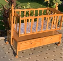 WOODEN BABY COT ALMOST NEW FOR URGNET SALE