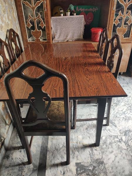 6 chairs dining table , 10/9 condition , 60cm length and 42cm width 0