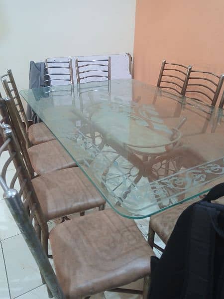 4×6 Glass Dinning Table With Iron Chairs 1