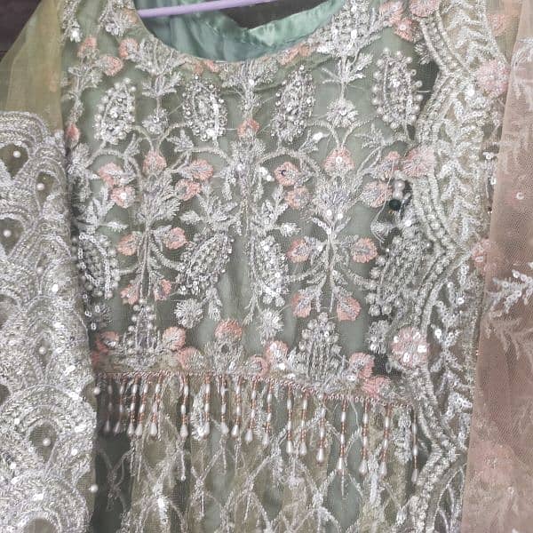 4 piece Rajisthani style net maxi frock with hand made work embroidery 3