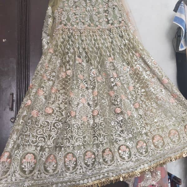 4 piece Rajisthani style net maxi frock with hand made work embroidery 4