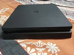 PlayStation ps4 Slim 1 Tb totally genuine and scratchless condition