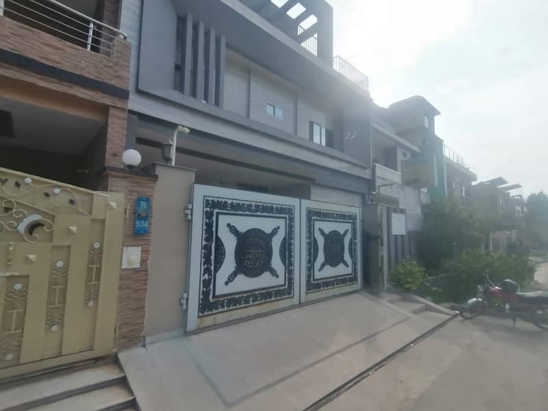 Triple Storey 10 Marla House For Sale In Pak Arab Society Phase 1 - Block B Lahore 1