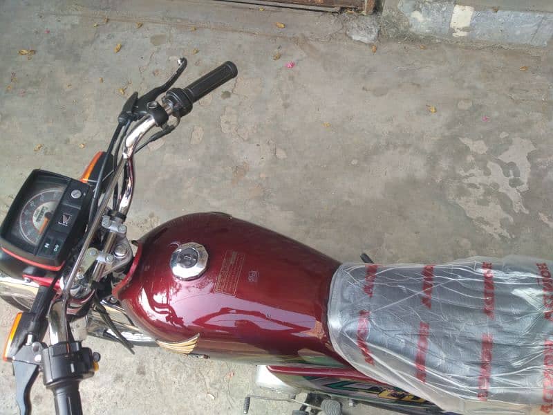 Honda 70 10by10 good condition 1