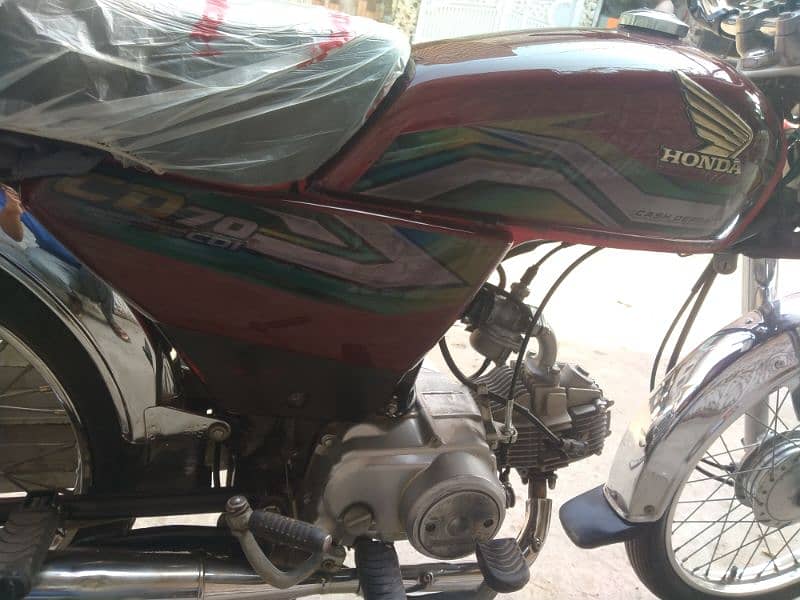 Honda 70 10by10 good condition 3