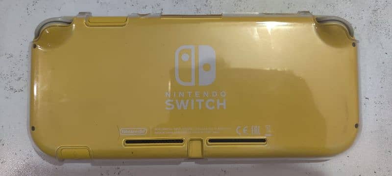 Nintendo switch lite + Mario kart 8 deluxe edition 3