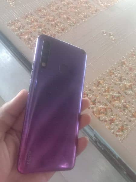 Tecno camon12air.  4. . . 64 2