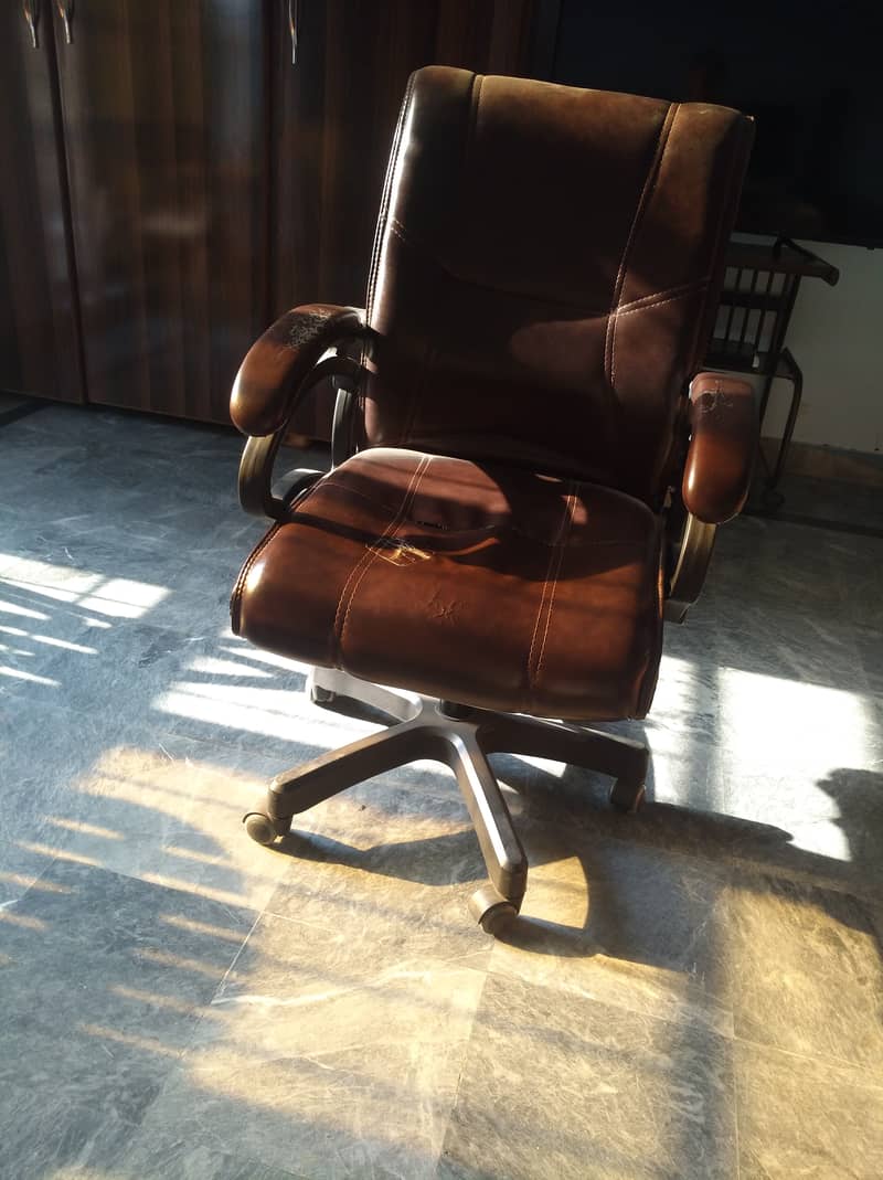 Used , revolving chair. 3