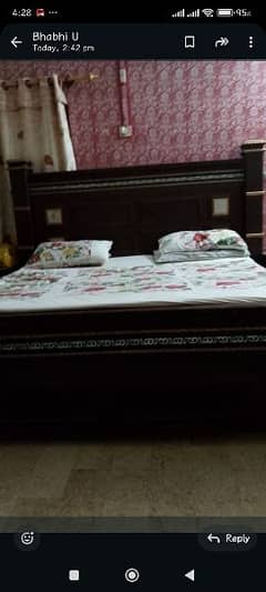 king size bed with side table