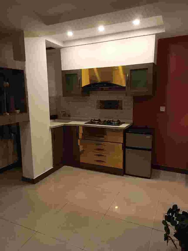 1BED FURNISHED Apartment IS AVAILABLE FOR RENT IN SECTOR B BAHRIA TOWN LAHORE 0