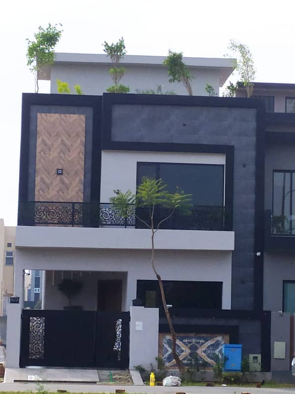 5 Marla Luxury House Available For sale In DHA Phase 9 Town Lahore 0