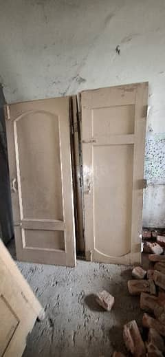 Used 11 Wood Doors, 5 Windows, 10 Iron doorframes