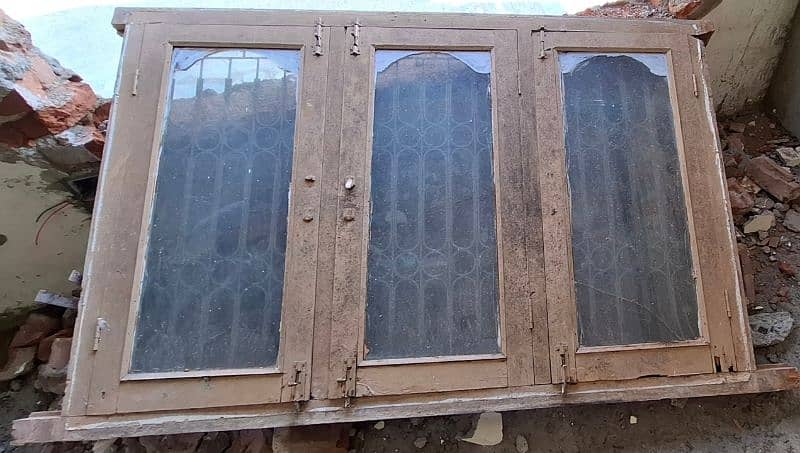 Used 11 Wood Doors, 5 Windows, 10 Iron doorframes 4