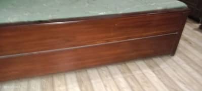 wooden bed in excellent condition with mattress and side tables