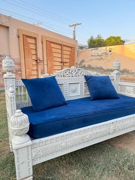 white sofa with blue velvet sofa seat with cushions 1