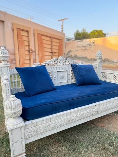 white sofa with blue velvet sofa seat with cushions 7